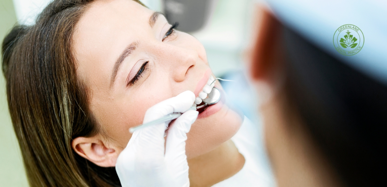 Patient receiving a thorough dental examination in Leigh, ensuring healthy teeth and gums for a brighter, confident smile.